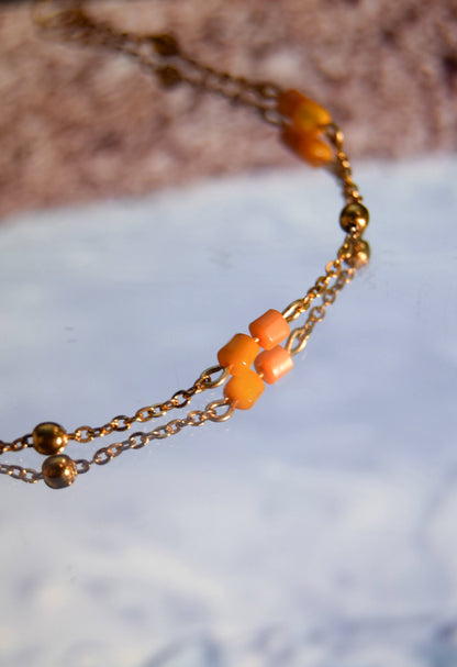 Orange seashell bracelet